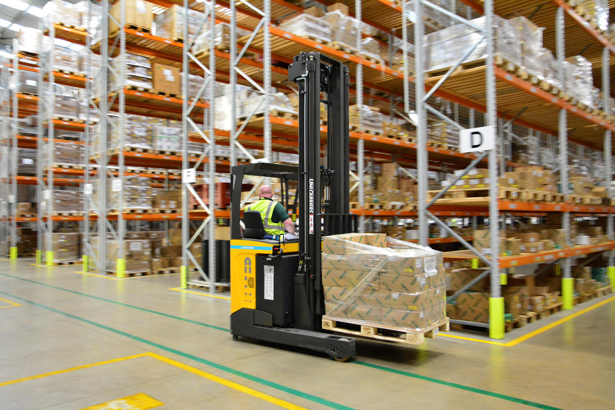 Warehouse with forklift truck